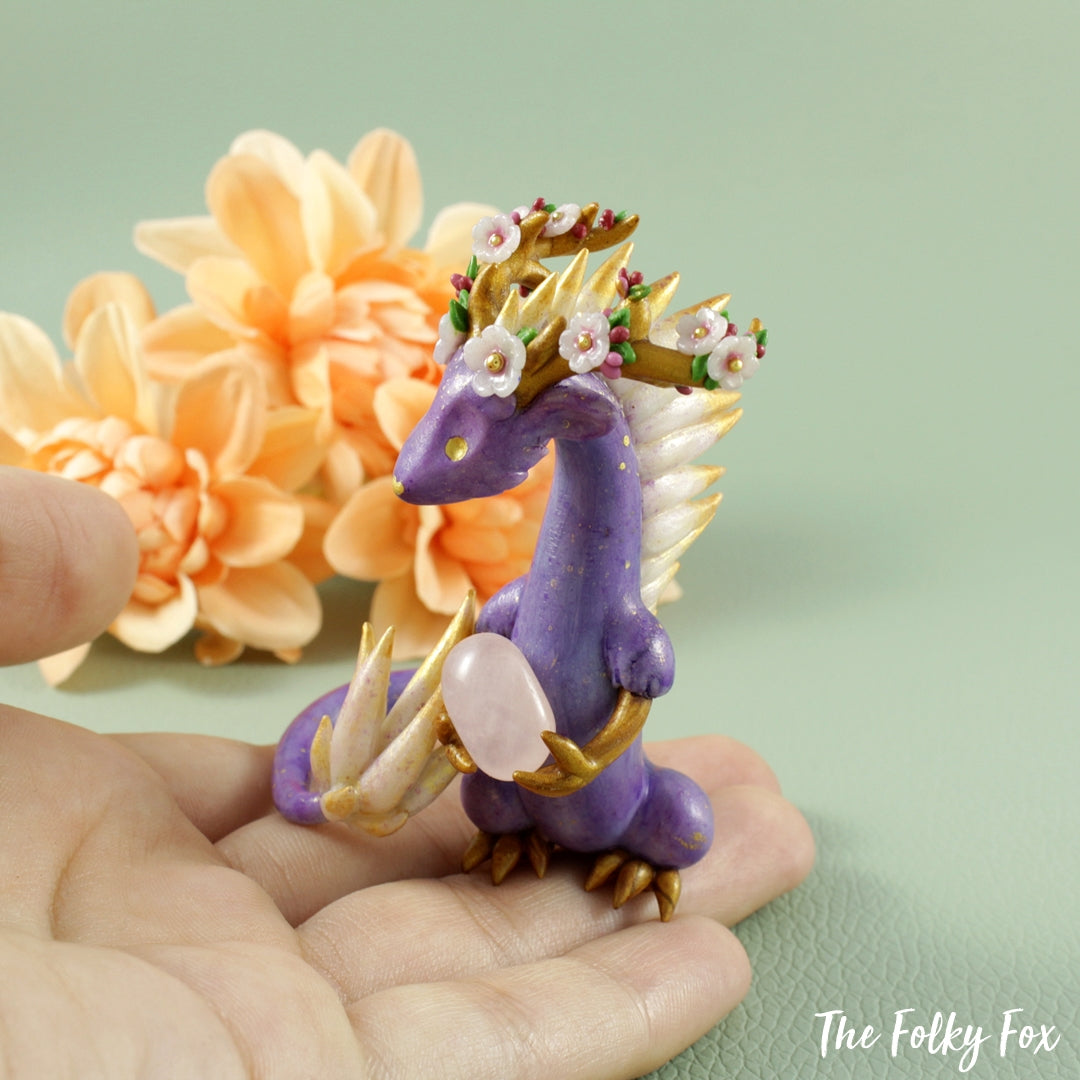 Sakura Dragon Holding a Rose Quartz in Polymer Clay - The Folky Fox