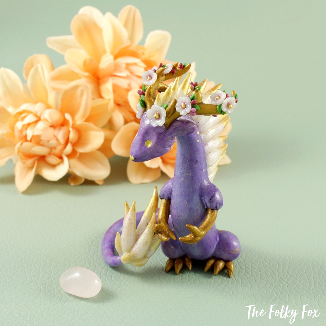 Sakura Dragon Holding a Rose Quartz in Polymer Clay - The Folky Fox